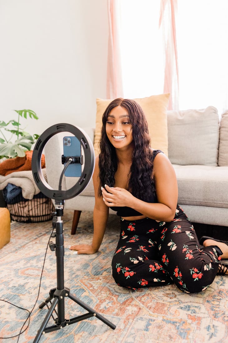 Woman Filming a Vlog in Her Living Room